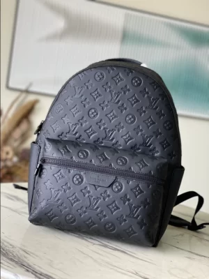 LOUIS VUITTON DISCOVERY BACKPACK MONOGRAM SHADOW - WLM519