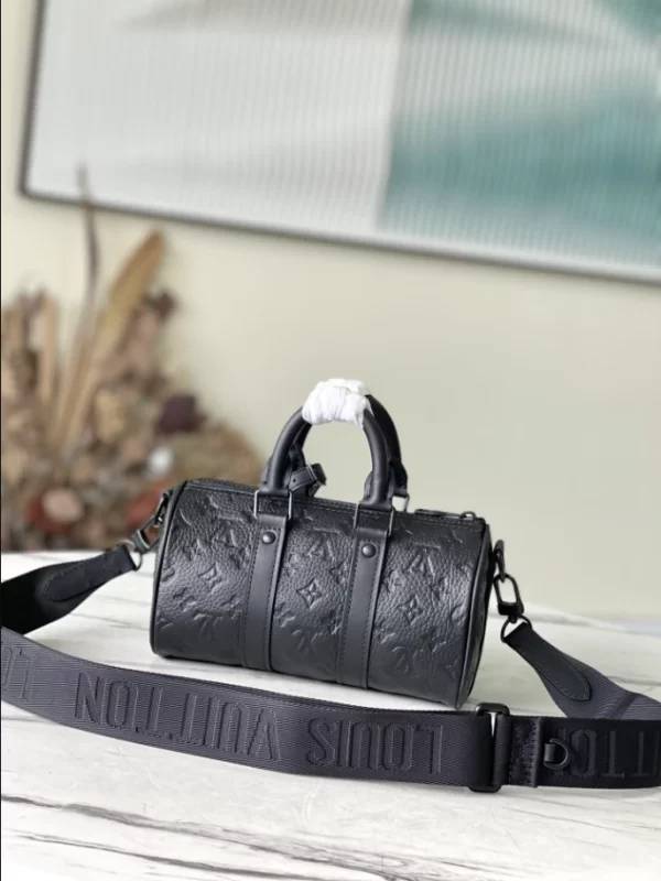 LOUIS VUITTON KEEPALL BANDOULIÈRE 25 BAG TAURILLON MONOGRAM - WLM555