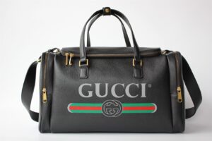 GUCCI RETRO LOGO PRINT LEATHER DUFFLE BAG - GC56