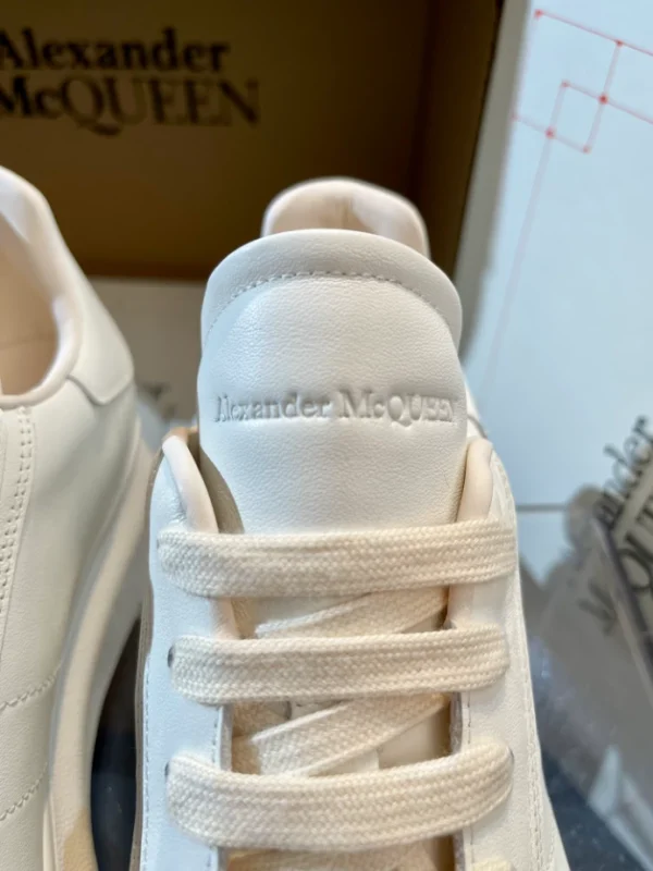 ALEXANDER MCQUEEN MEN'S OVERSIZED RETRO SNEAKER IN OFF WHITE - AM27